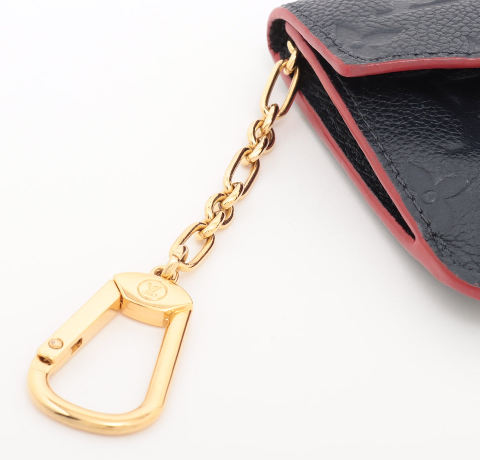 Louis Vuitton monogram empreinte Pochette Cure Marine rouge Coin