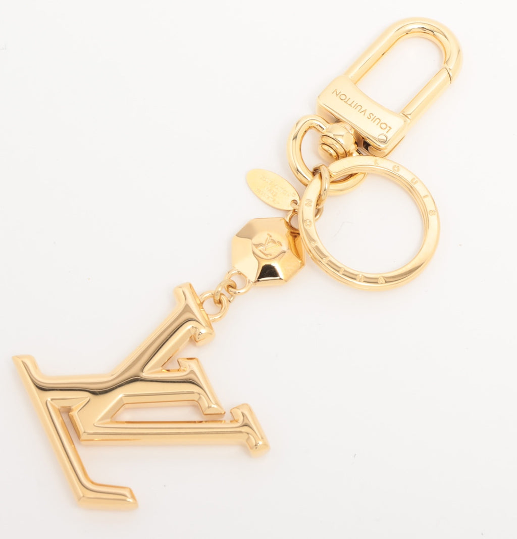 Louis Vuitton Porto Cure LV facet Charm GP Gold Wears Losing