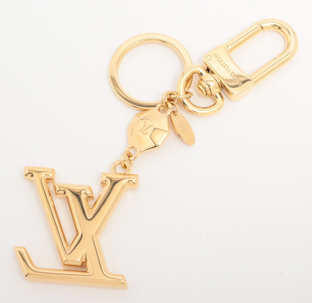 Louis Vuitton Porto Cure LV facet Charm GP Gold Wears Losing