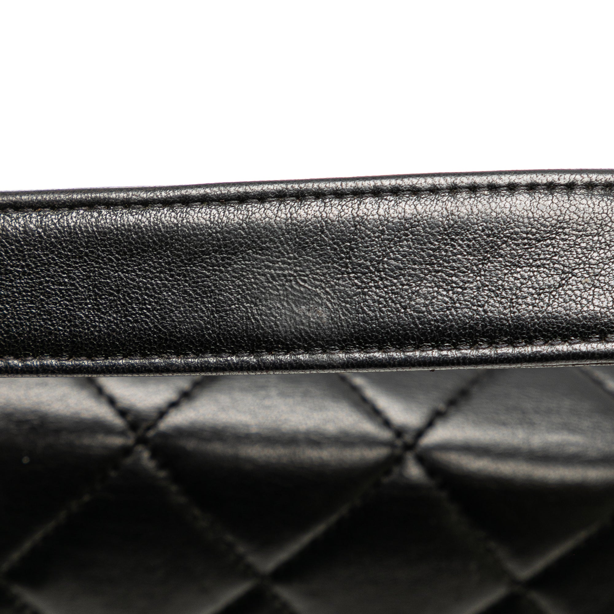 CHANEL Quilted Lambskin Leather Handbag