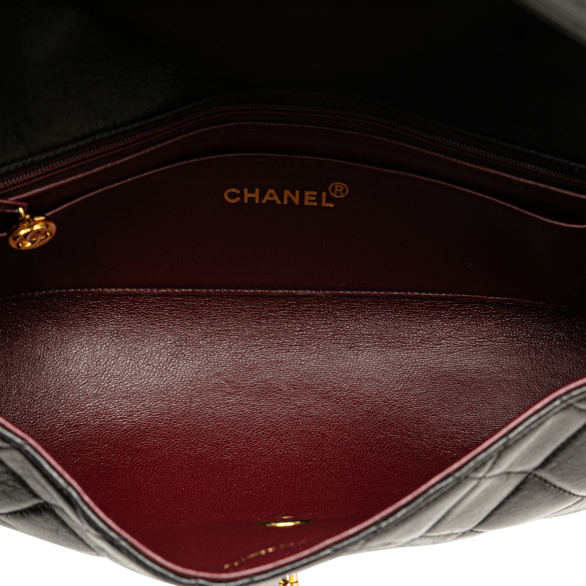 CHANEL Quilted Lambskin Leather Handbag