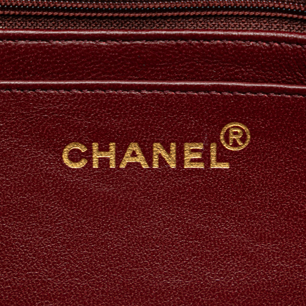 CHANEL Quilted Lambskin Leather Handbag