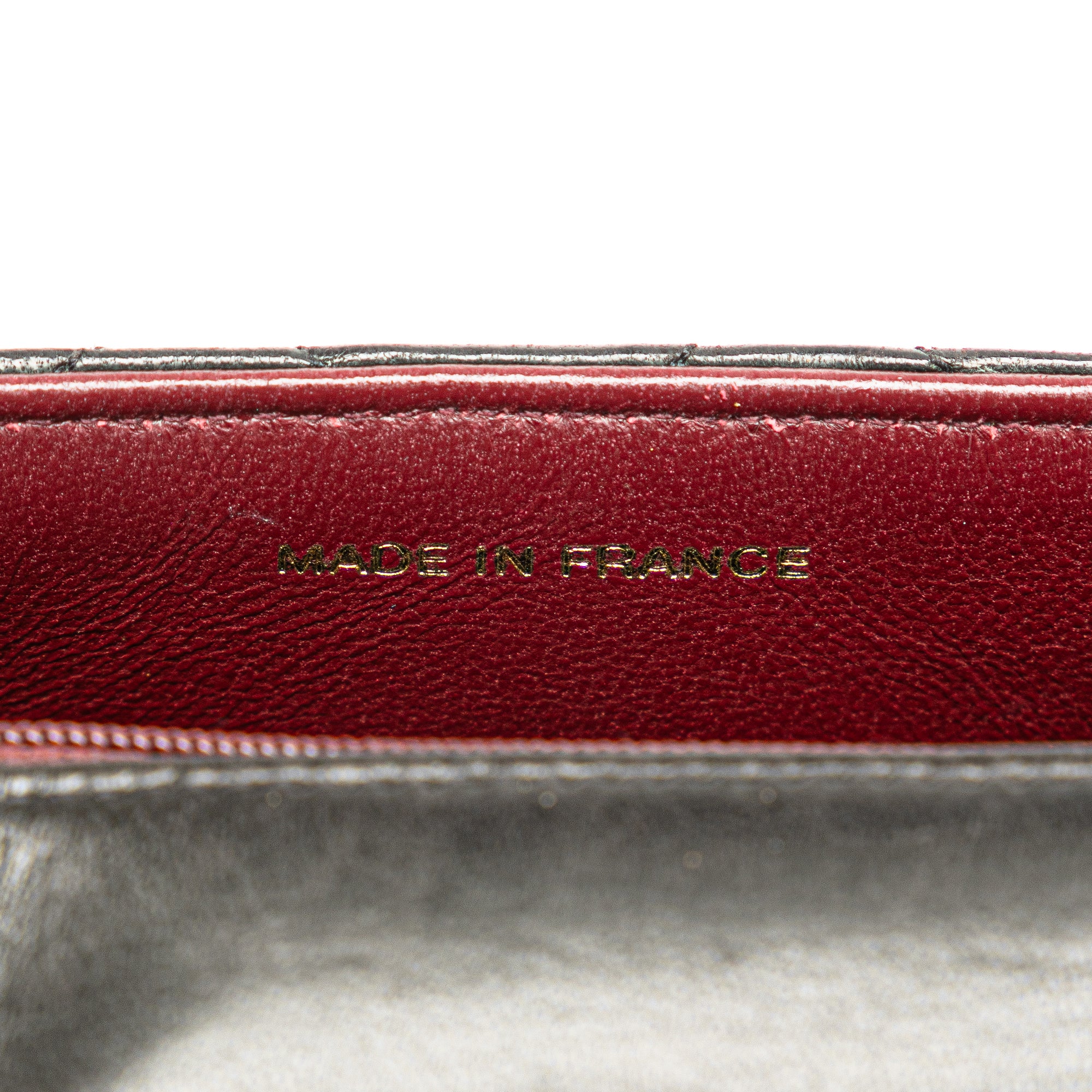 CHANEL Quilted Lambskin Leather Handbag