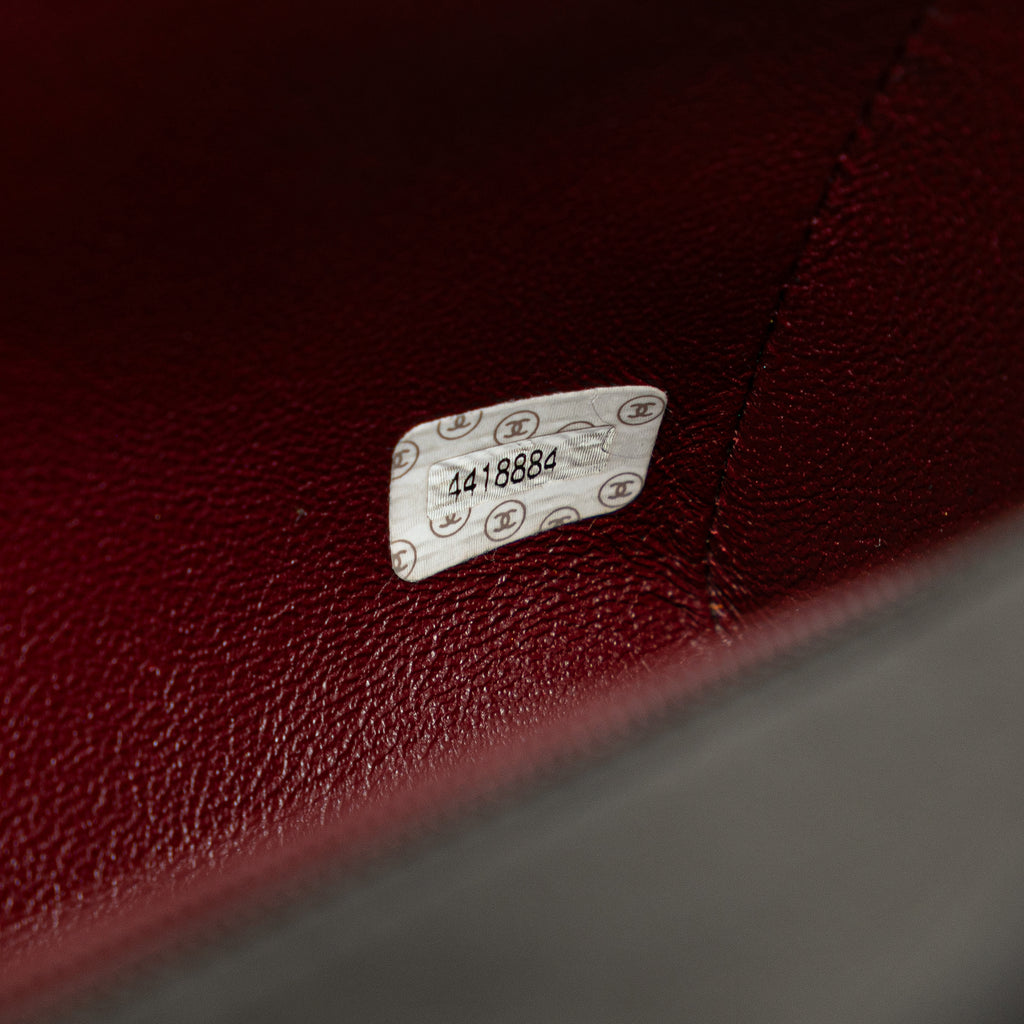 CHANEL Quilted Lambskin Leather Handbag