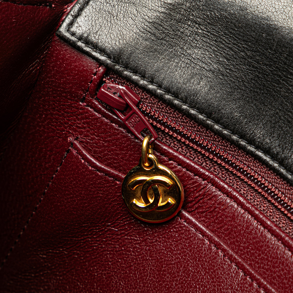 CHANEL Quilted Lambskin Leather Handbag